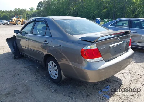 2006 Toyota Camry Le z USA, uszkodzony, nr VIN 4T1BE32KX6U698737